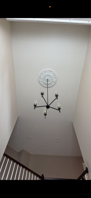 Stunning Chandelier Installation for a Safe and Modern Home image