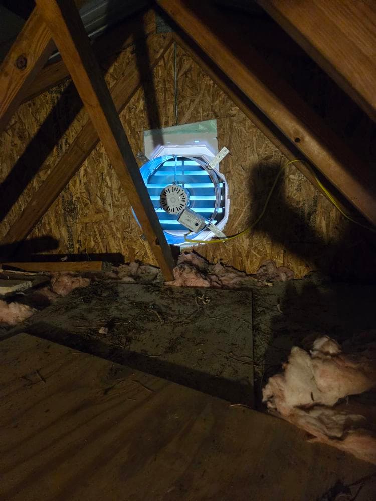 Two Gable Fans Installed in a Detached Garage to Stop Wood Rot image